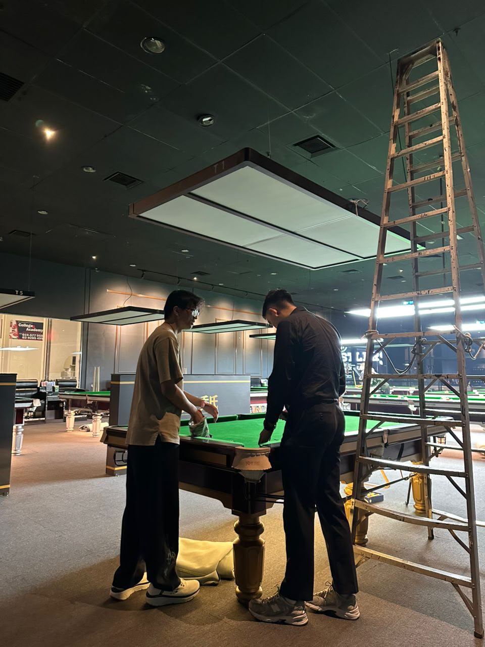 Our team on the ground — professional installation, hands-on support, and a drive to bring new technology to the billiard industry.